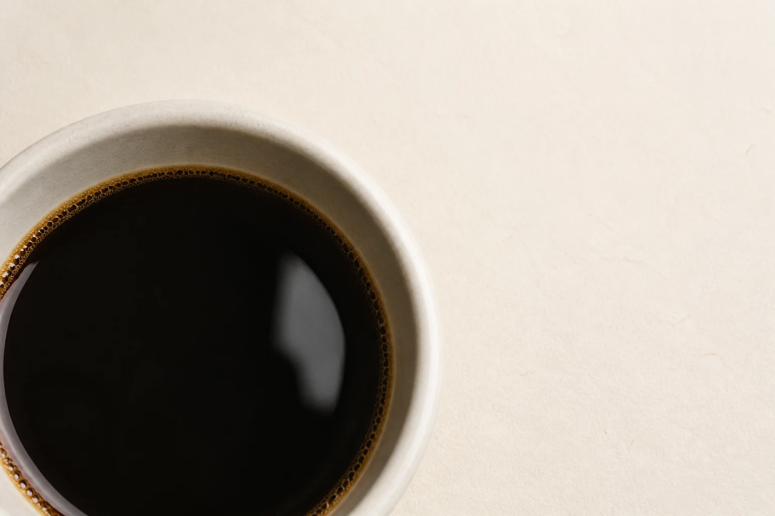 Fresh espresso with a dense crema surface, ready to be tasted and recorded.